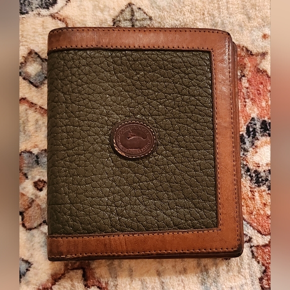 Dooney & Bourke Handbags - Dooney & Bourke Rare Olive Green Vintage All Weather BiFold wallet.